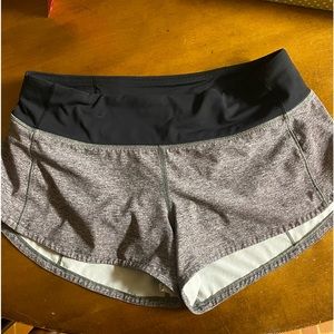 Lululemon 2.5 running shorts, Minimal wear, women’s Gray with black trim.